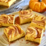 These Swirled Pumpkin Cheesecake Bars