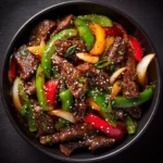 Delicious Chinese pepper steak with onions served on a plate