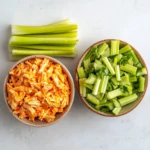 Buffalo Chicken Salad with spicy chicken, greens, and ranch dressing in a bowl