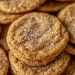 Freshly baked chewy brown sugar cookies on a cooling rack.