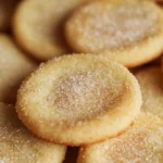 Delicious soft sugar cookies on a cooling rack, perfect for dessert.