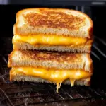 Delicious air fryer grilled cheese sandwich, golden and crispy.