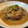 Delicious Easy Salisbury Steak with Mushroom Gravy served on a plate