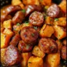 Honey Garlic Sausage cooking with sweet potatoes in a skillet
