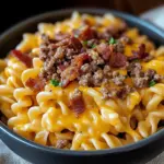 Loaded Bacon Cheeseburger Pasta topped with cheese and bacon