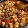 Delicious one-pot venison goulash served in a rustic bowl