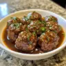 Slow Cooker Salisbury Steak Meatballs served on a plate