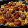 Sticky Honey Garlic Sausage Pasta Skillet served in a skillet
