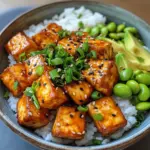 Delicious sticky tofu bowls with colorful vegetables and grains