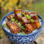 Delicious teriyaki tofu served with fresh vegetables and rice