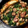 White Bean Sausage Skillet featuring herbs and spices in a vibrant pan
