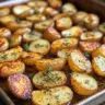 Delicious easy sheet pan scored potatoes with crispy edges and flavorful seasoning.