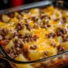 Delicious Cheesy Beef and Potato Casserole served in a baking dish.