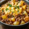 Cheesy ground beef and potato casserole in a baking dish