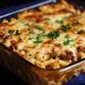 A delicious dish of creamy baked macaroni topped with cheese and breadcrumbs