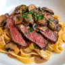Creamy mushroom steak pappardelle with herbs and Parmesan cheese