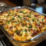 Creamy ranch cowboy casserole in a baking dish topped with cheese