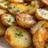 Crispy garlic butter potatoes served as a flavorful side dish.