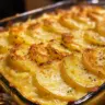 Creamy Mashed Potato Gratin topped with cheese and herbs