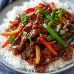 Plate of Mongolian beef with vegetables and rice