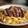 Delicious One-Pan Creamy Steak Pasta served in a bowl
