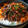 Delicious dish of spicy firecracker beef served with vegetables