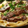 Delicious Steak Alfredo Spaghetti with creamy sauce and tender steak pieces.