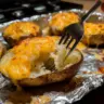 Delicious Twice Baked Potatoes topped with cheese and herbs
