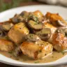 Chicken breast in creamy mushroom sauce served on a plate