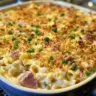 Delicious ham noodle casserole served in a bowl, perfect for leftovers.