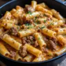 Creamy sausage rigatoni pasta served in a bowl