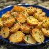 Crispy garlic parmesan crusted potatoes on a serving platter
