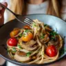 Delicious easy vegan mushroom pasta topped with fresh herbs and spices.