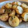 Delicious garlic sauce drizzled over roasted baby potatoes