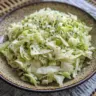 Green Goddess Cabbage Salad with fresh greens and dressing