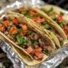 Delicious grilled meat tacos served with fresh toppings and salsa