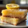 Freshly baked lemon brownies with a zesty glaze on top