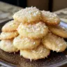 Delicious Lemon Coconut Cheesecake Cookies on a plate