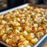 Sheet Pan Potato Cauliflower recipe with roasted veggies on a baking sheet