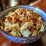 Southern fried cabbage with crispy bacon served in a skillet