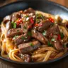 Delicious Sweet and Spicy Garlic Steak Pasta served on a plate