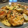Tender chicken with artichoke hearts dish, showcasing a delicious gourmet meal.