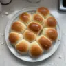 Freshly baked 30-minute dinner rolls served warm on a plate