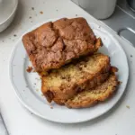 Loaf of freshly baked Amish Cinnamon Bread with a cinnamon sugar crust.