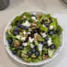 Easter Spring Salad with Goat Cheese and fresh vegetables in a beautiful bowl