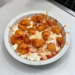 Cottage Cheese Chicken Parmesan Bowl with fresh ingredients and cheese