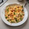 Creamy low carb chicken casserole dish with vegetables and cheese