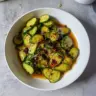 Easy Asian cucumber salad with fresh vegetables and dressing