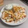 Easy chicken bacon ranch quesadilla with crispy bacon and melted cheese
