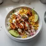 Delicious Easy Street Corn Chicken Bowl with corn, chicken, and toppings.